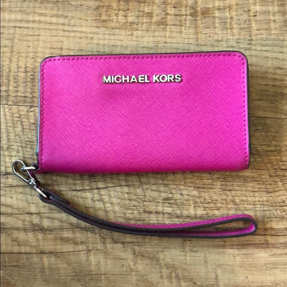 Pink Michael Kors wristlet wallet